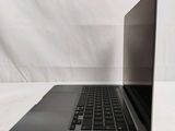 a laptop computer that is sitting on a table