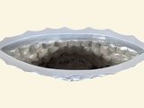 a picture of a bowl with a hole in it