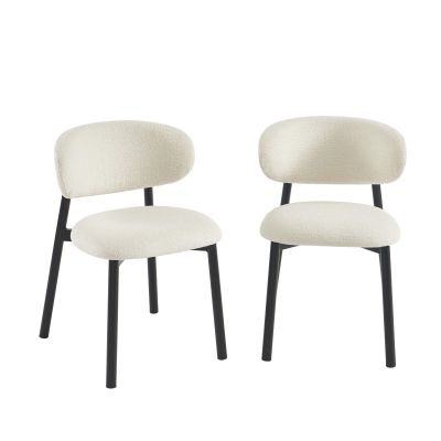 deux chaises blanches aux pieds noirs et à l'assise blanche