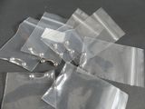 a bunch of plastic bags that are sitting on a table