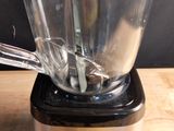 a blender that is sitting on top of a wooden table