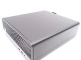 an image of a silver computer on a white surface with a white background