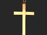 une croix dorée sur fond noir