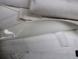a close up of a person ' s pants and a white shirt