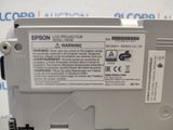 an image of a close up of a printer with a label on it