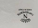 an image of a close up of a plate with a black and white design