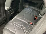 a car that has a black seat cover on it