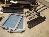 a lot of different types of electronic equipment on the table