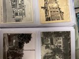 four old photos of a train on display in a box