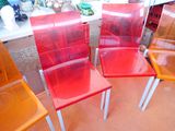 three chairs that are sitting next to each other on the floor
