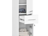 un gros plan sur une armoire blanche à deux tiroirs avec des serviettes