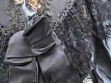 an image of a woman ' s dress with a large bow on it