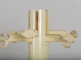 a close up of a metal pole with two hooks on it
