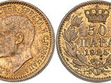 a gold sovereign coin with a crown on top of it