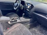 the interior of a car with a steering wheel and a dashboard