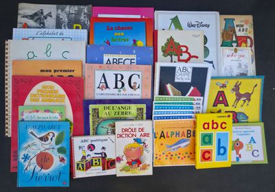 many children ' s books on the table together