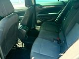 the back seats of a car are empty with no one in it