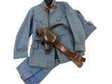 an image of a blue suit with a brown belt and a brown bag