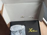 a box with a pair of shoes in it on a table