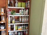 a room with a lot of items on the shelves
