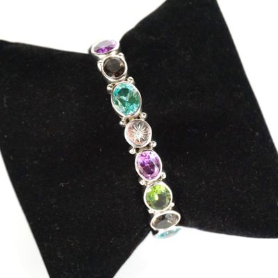 Bracelet jonc en argent (925/oo) sertie de 15 pierres fines …