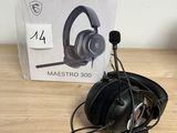 a box with a pair of headphones sitting on a table