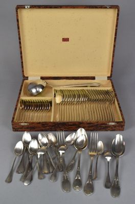a lot of silver spoons and spoons in a case