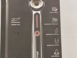 a box with a razor inside of it on a table