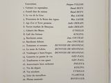 an open book with a list of artists on it