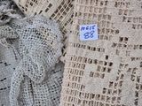 a pile of burlock fabric with a price tag on it