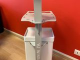 grey and white medical cart with wheels and wheels on a wooden floor