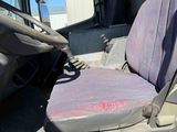 a seat in the back of a truck that has been vandalized