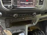 a car dashboard with a radio and other items in it