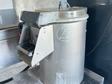 a machine that is sitting on a table in a kitchen