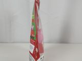 a red toothbrush in a box on a white table