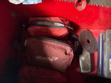 a tool box with tools in it on the floor