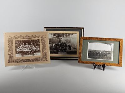 three framed photographs of a group of people on a white background