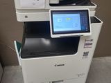 a printer that is sitting on top of a table