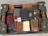 a box full of old books sitting on the floor