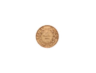 a close up of a gold coin on a white background