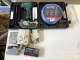 a box of tools on a table with a box of wires
