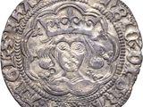 une pièce d'argent surmontée d'une couronne