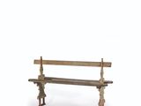 a wooden bench that is sitting on a white surface