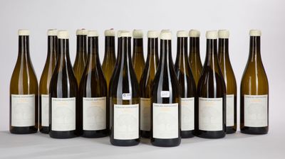 six bottles of wine are lined up in a row on a table