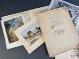 a lot of books that are sitting on a table