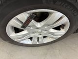 a close up of a tire with a sticker on it