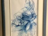 tableau représentant un enfant tenant un ours en peluche, dans un cadre bleu