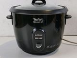 a black crock pot sitting on a counter