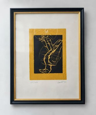 a black and gold framed picture of a plant with a yellow border