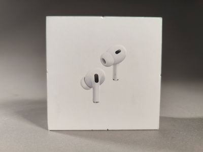 an apple airpods are sitting on top of a white box